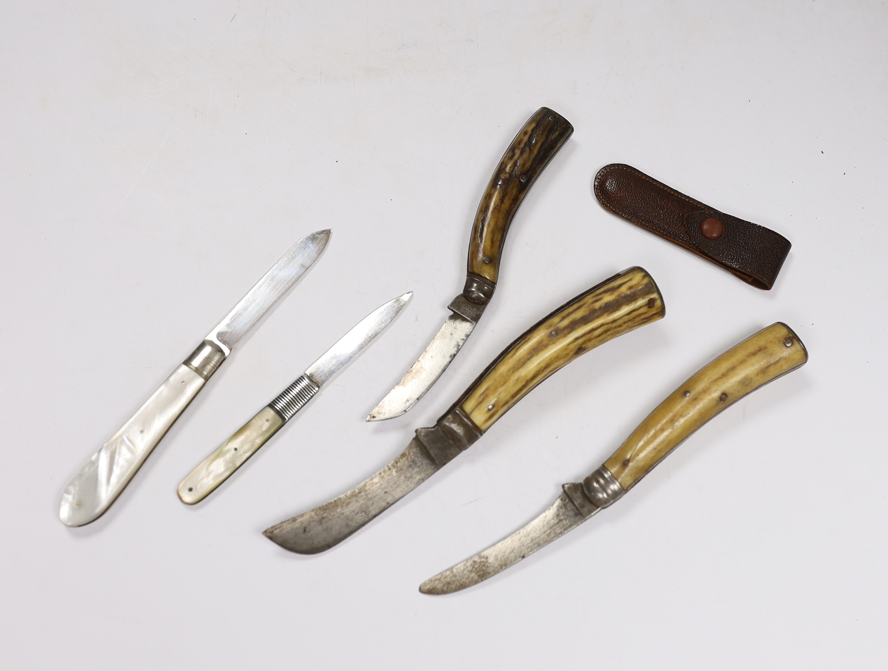 Six penknives, folding fruit knives, etc. including three antler/bone handled pruning knives by Thomas Turner, Suffolk, W. Saynor, Sheffield, etc., longest blade 7cm, and three smaller knives including a silver example a